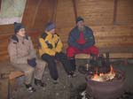 38-Tina, Leah & Mika keep warm in a Fiinnish hut