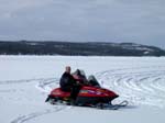 47-Laurie enjoys skidooing across the Kuusamo frozen lakes at 170kph