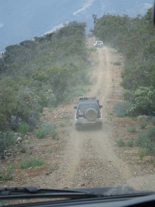 22-Convoy creates dust on Cobb Spur Track